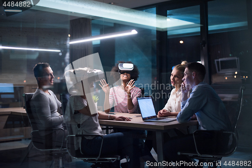 Image of Multiethnic Business team using virtual reality headset