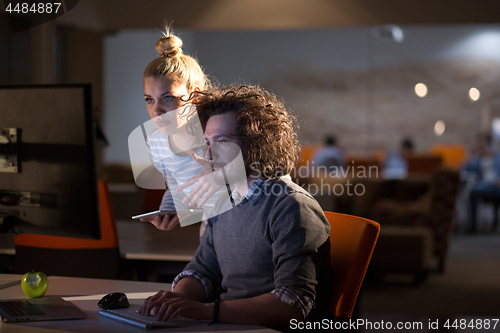 Image of young designers in the night office