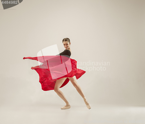 Image of Modern ballet dancer dancing in full body on white studio background.