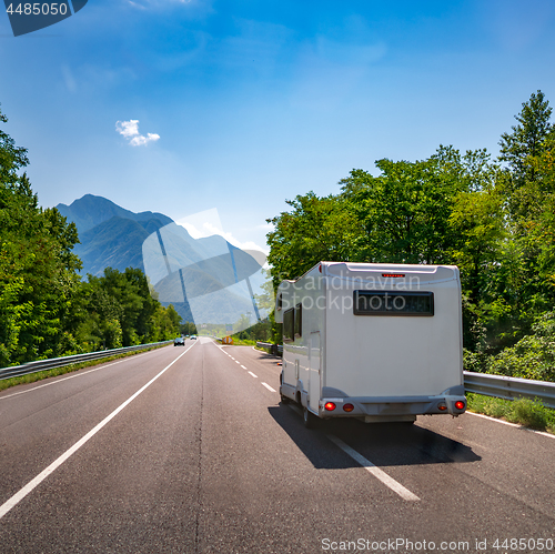 Image of VR Caravan car travels on the highway.