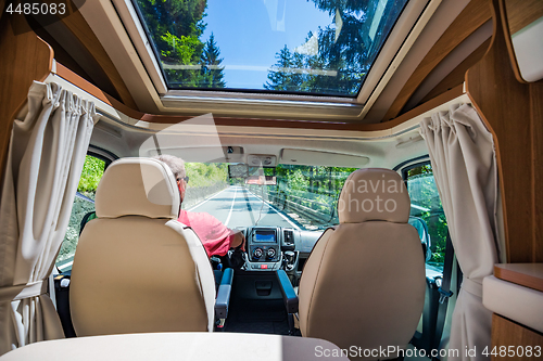 Image of Man driving on a road in the Camper Van RV