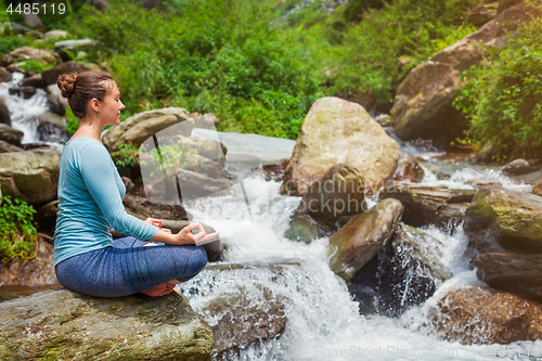 Image of Woman in Padmasana outdoors