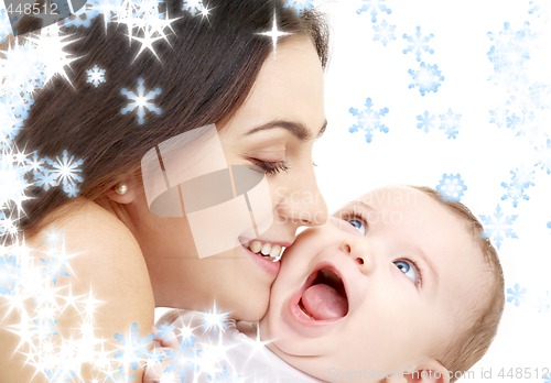 Image of playful mama with happy baby