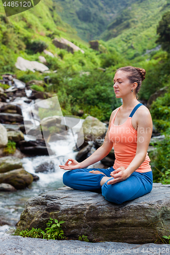 Image of Woman in Padmasana outdoors