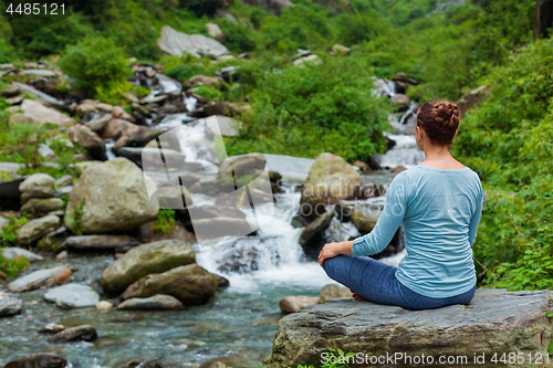 Image of Woman in Padmasana outdoors