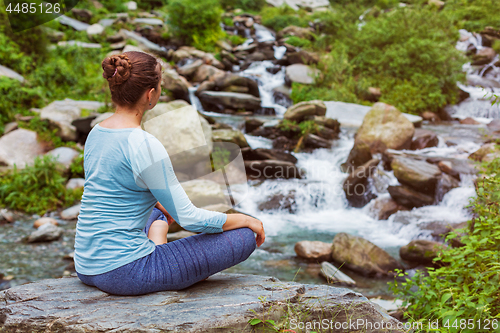 Image of Woman in Padmasana outdoors