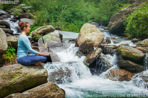 Image of Woman in Padmasana outdoors