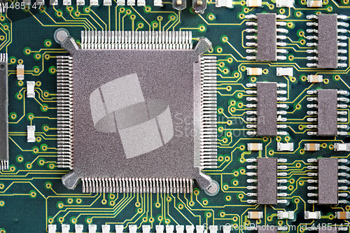 Image of PCB Printed Circuit Board with many electrical components