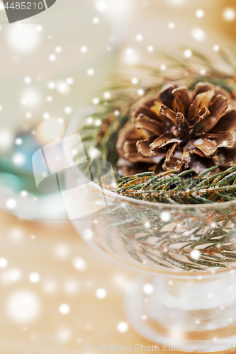 Image of close up of christmas decoration of fir and cone