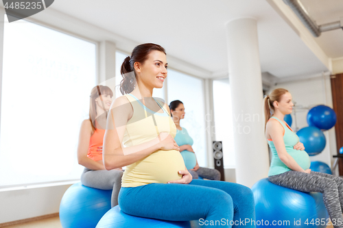 Image of pregnant women sitting on exercise balls in gym