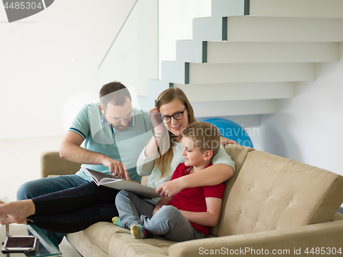 Image of family with little boy enjoys in the modern living room