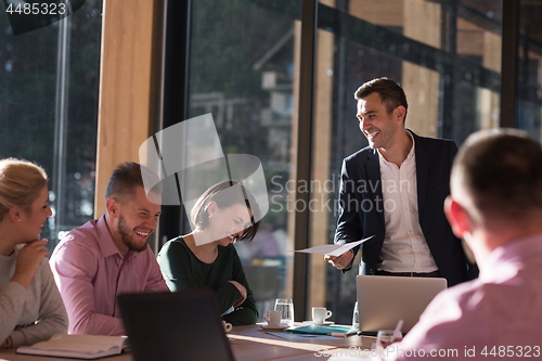 Image of Business Team At A Meeting at modern office building