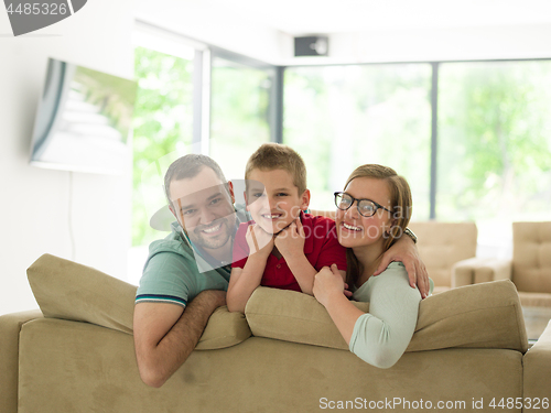 Image of family with little boy enjoys in the modern living room