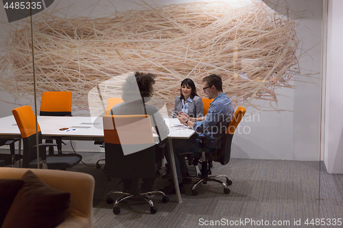 Image of Business Team At A Meeting at modern office building