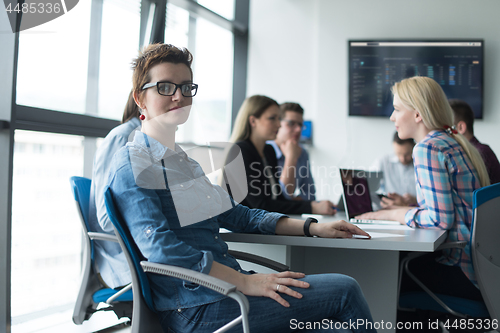 Image of Business Team At A Meeting at modern office building