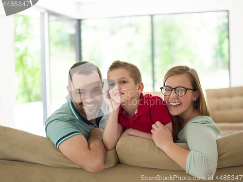 Image of family with little boy enjoys in the modern living room