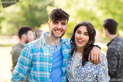 Image of happy couple in summer park
