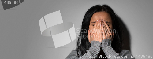 Image of sad crying woman in despair