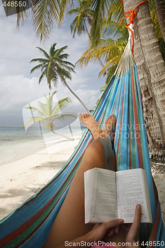 Image of Woman Reading in a Hammock