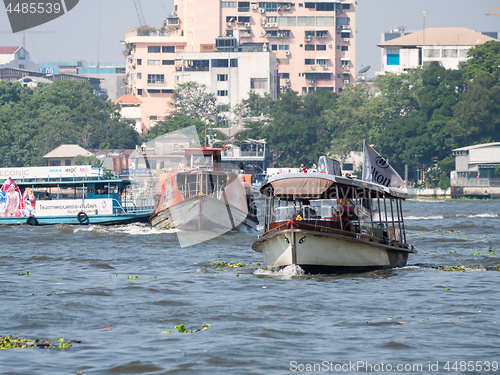 Image of Ferry traffic on the Chao Praya River in Bangkok