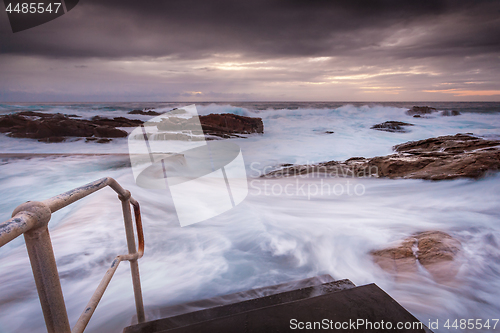 Image of Coastal pool overflow in big seas