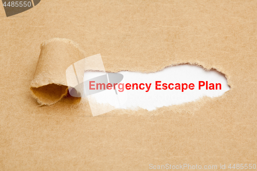 Image of Emergency Escape Plan Torn Paper Concept