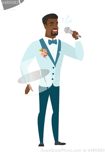 Image of African-american groom singing to the microphone.