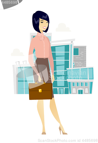Image of Asian business woman holding briefcase.