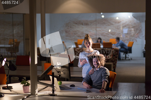 Image of young designers in the night office