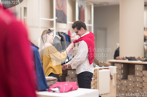 Image of couple in  Clothing Store