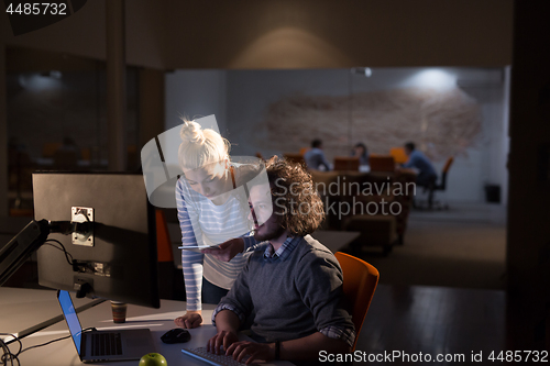 Image of young designers in the night office