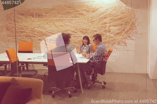 Image of Business Team At A Meeting at modern office building