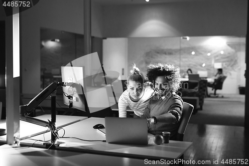 Image of young designers in the night office