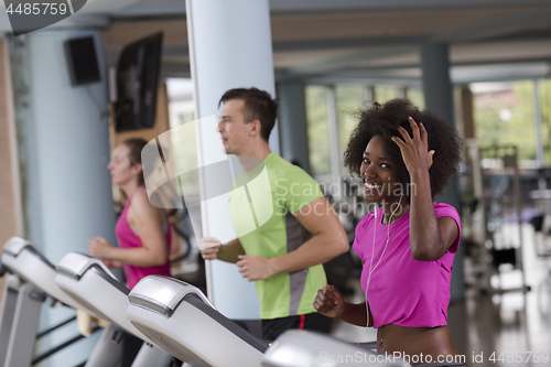 Image of people exercisinng a cardio on treadmill in gym