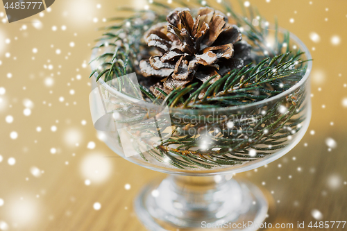 Image of close up of christmas decoration of fir and cone