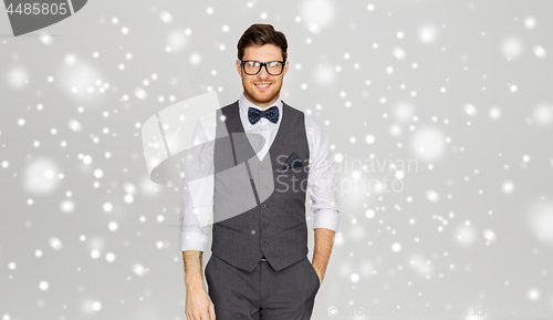 Image of happy man in festive suit and eyeglasses