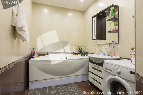 Image of Bathroom interior, spacious bath, washbasin