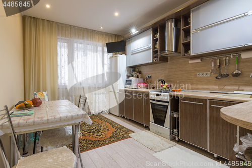 Image of Interior spacious kitchen in a residential apartment