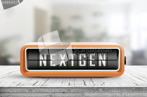 Image of Nextgen word on an alarm device in orange color