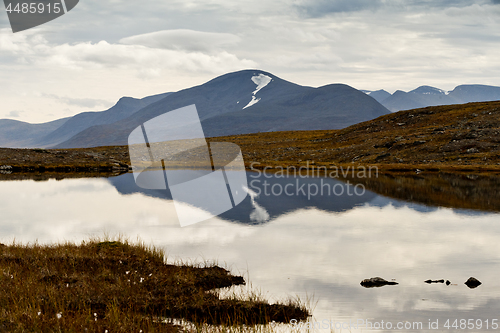 Image of Lake and mountain in autumn. Northern Sweden