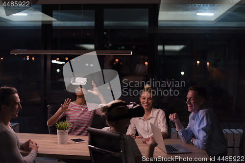 Image of Multiethnic Business team using virtual reality headset