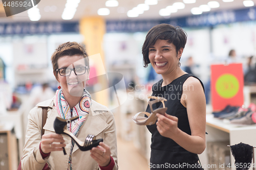 Image of best friend shopping in big mall