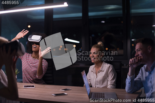 Image of Multiethnic Business team using virtual reality headset