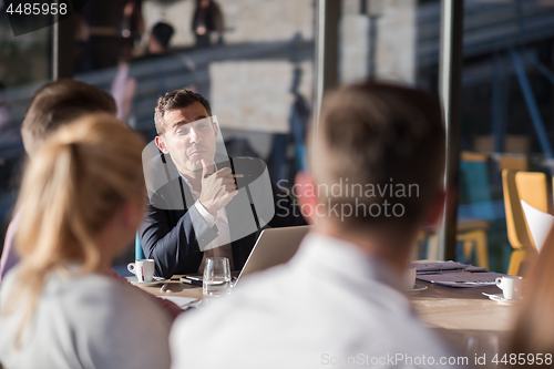 Image of Business Team At A Meeting at modern office building