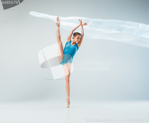 Image of Modern ballet dancer dancing in full body on white studio background.