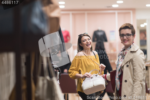 Image of best friend shopping in big mall