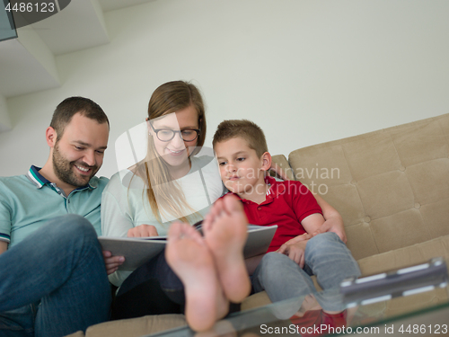 Image of family with little boy enjoys in the modern living room