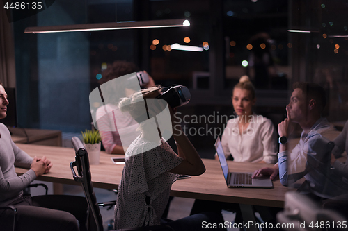 Image of Multiethnic Business team using virtual reality headset