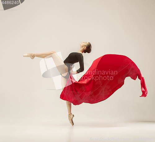 Image of Modern ballet dancer dancing in full body on white studio background.