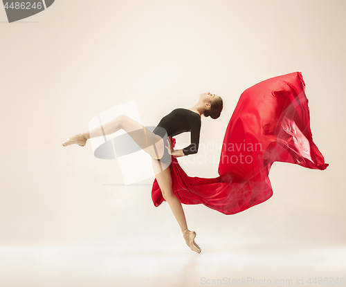 Image of Modern ballet dancer dancing in full body on white studio background.